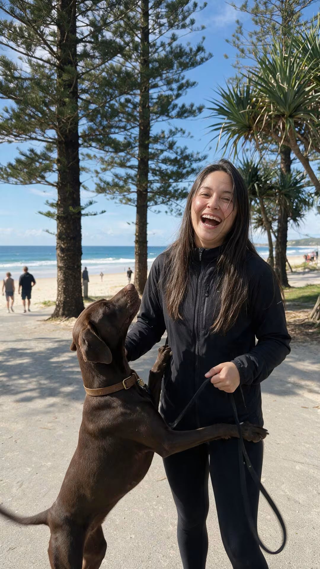 Giovana rewarding a dog during a training moment